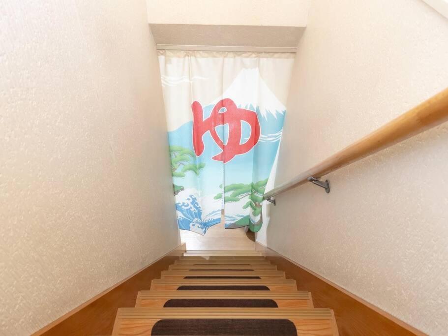 団,最大16名,レンタルサイクル無料,usjまで好アクセスの3階建て Apartamento