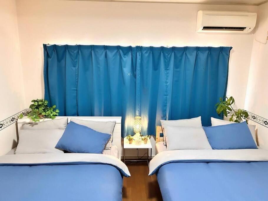 Apartamento 団,最大16名,レンタルサイクル無料,usjまで好アクセスの3階建て Osaka