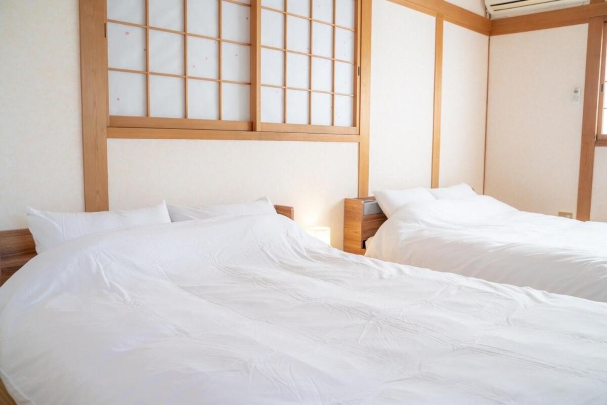 団,最大16名,レンタルサイクル無料,usjまで好アクセスの3階建て Apartamento *