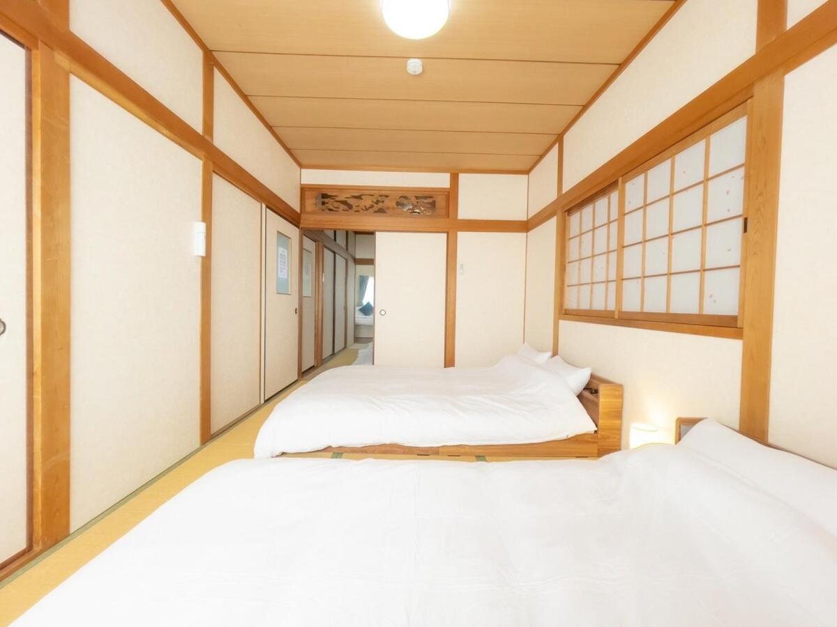 団,最大16名,レンタルサイクル無料,usjまで好アクセスの3階建て Apartamento