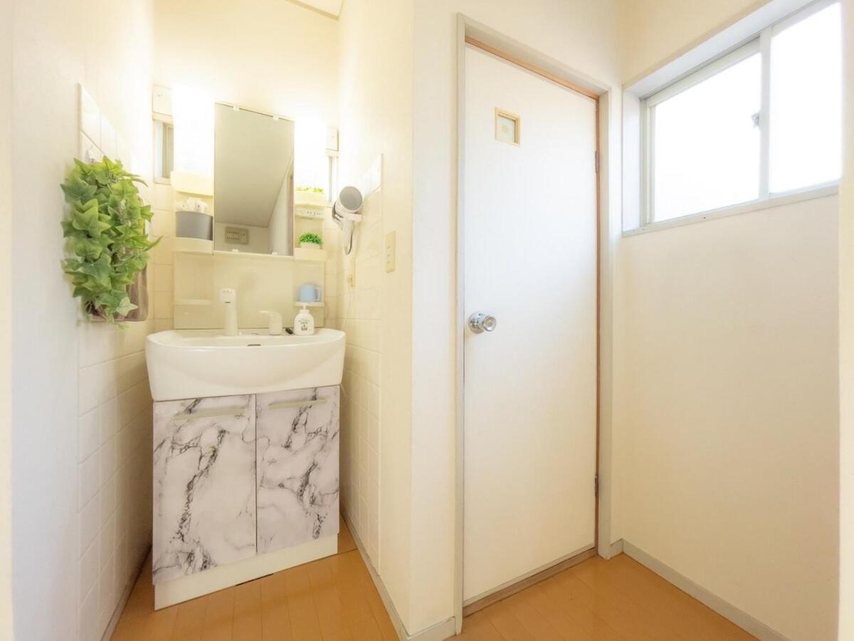 団,最大16名,レンタルサイクル無料,usjまで好アクセスの3階建て Apartamento Osaka
