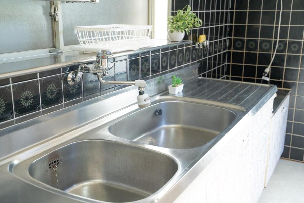 Apartamento 団,最大16名,レンタルサイクル無料,usjまで好アクセスの3階建て